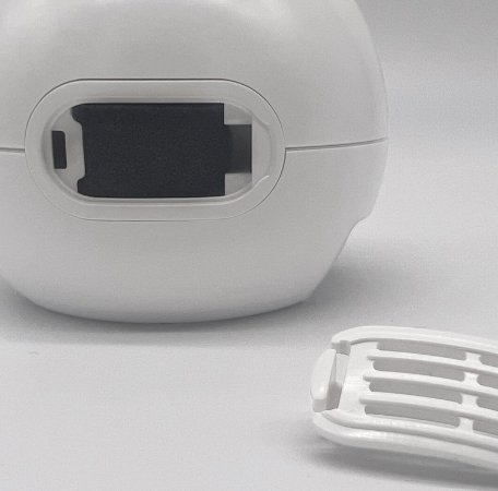 Close-up of the Transcend Micro CPAP with the filter compartment open, showing the filter slot and removable cover for easy maintenance and filter replacement.